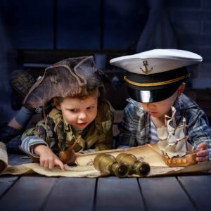 Boys play in the sea battle